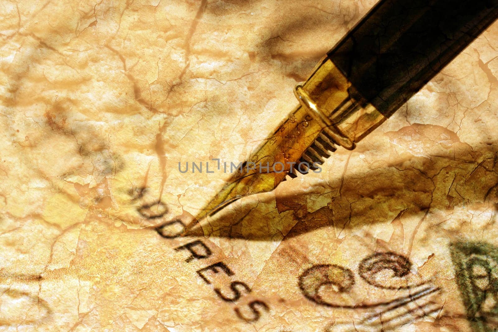 Fountain pen on old postcard