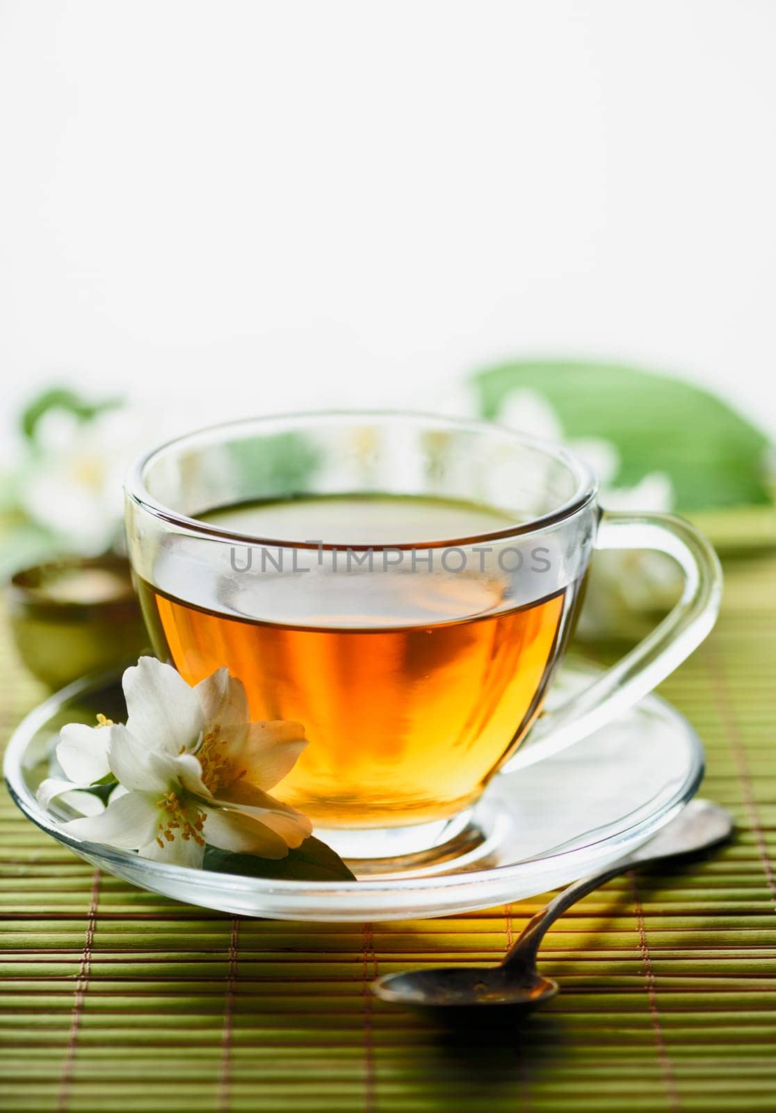 Jasmine and green tea with white copyspace