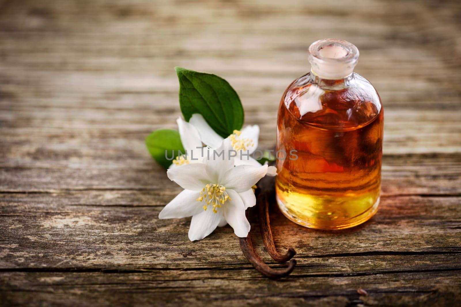 Essential oil with jasmine flower and vanilla