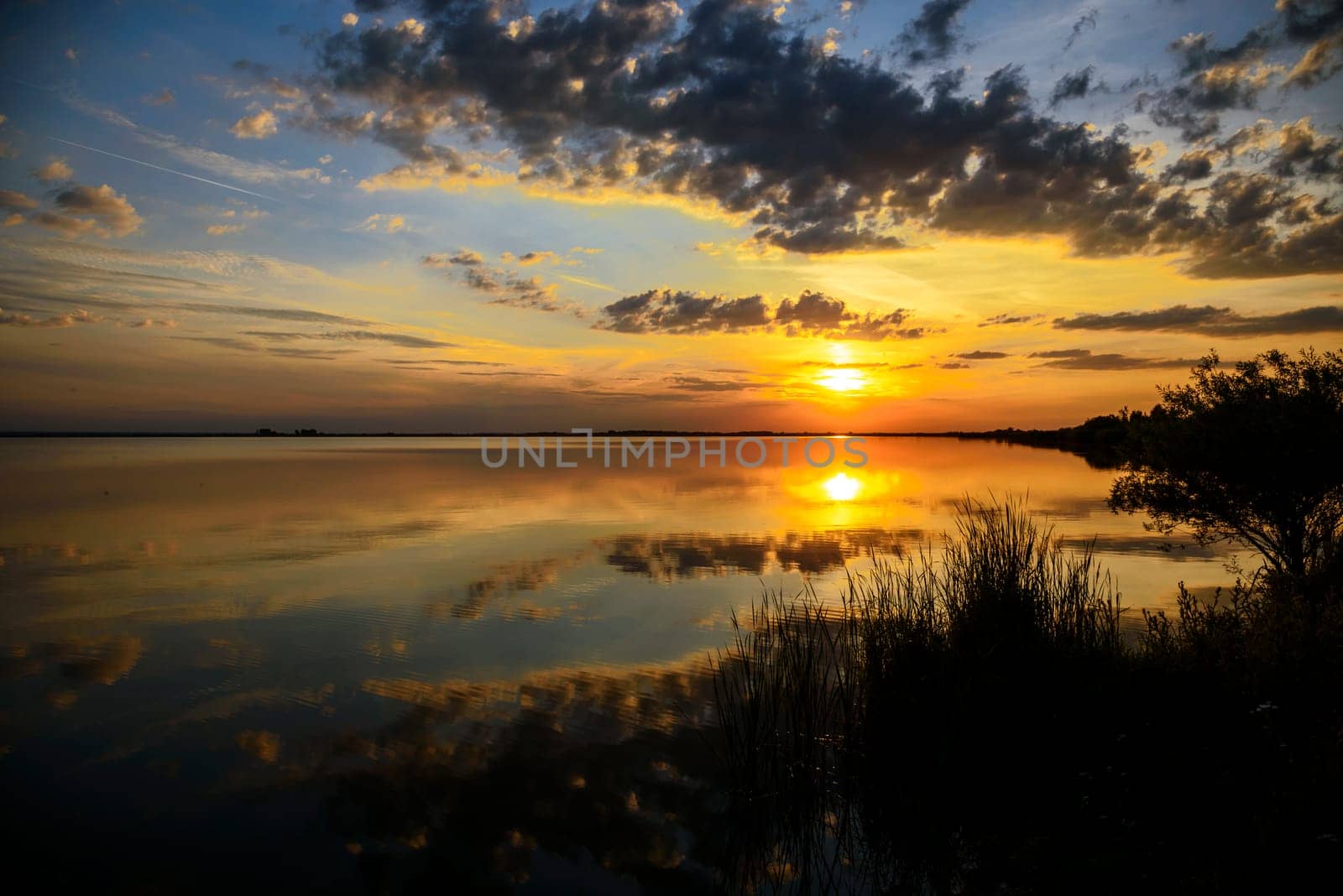 Beautiful summer sunset at the lake.
