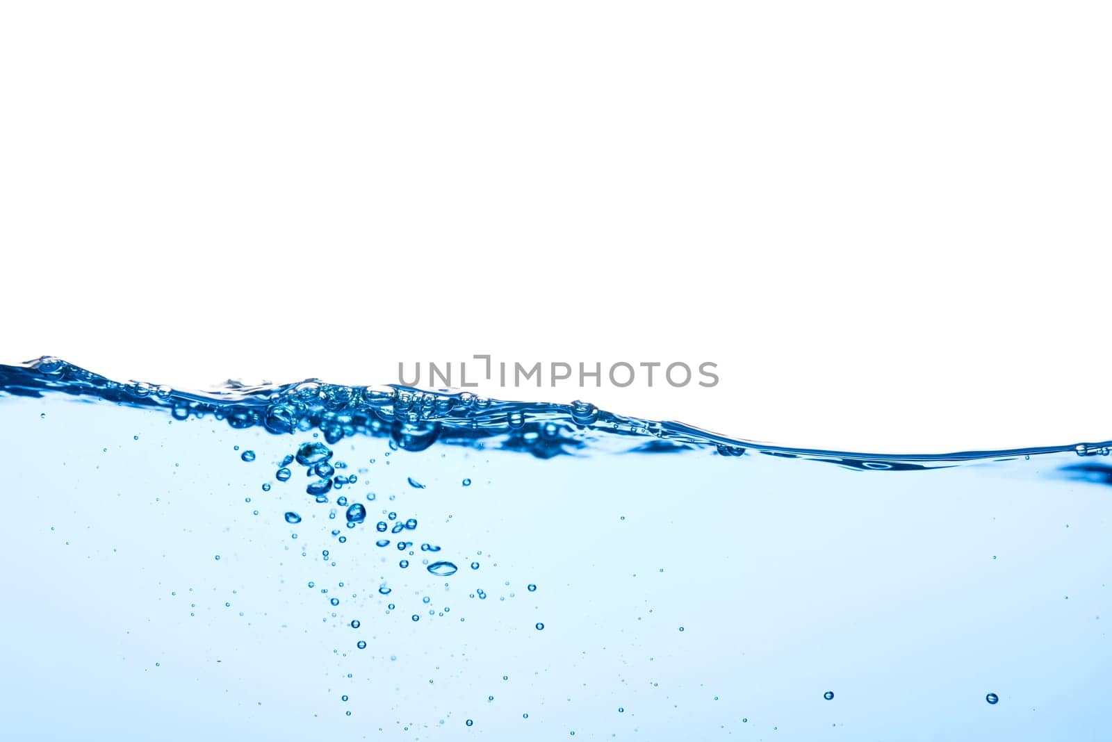 Light blue water wave with air bubbles and a little bit splashed underwater, studio shot isolated on white background. The abstract clean surface on liquid