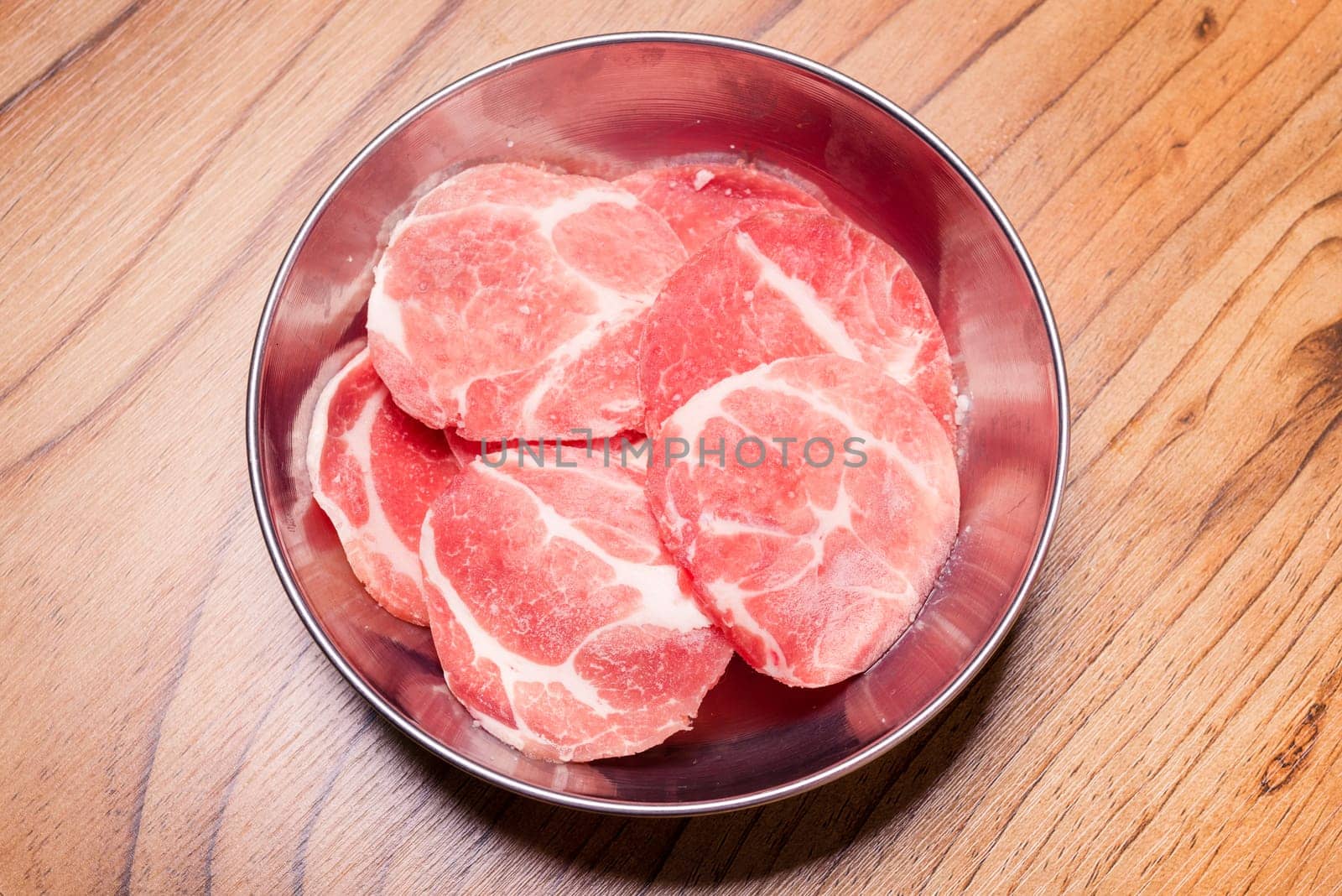 Raw pork on plate, Korean traditional style fresh pork beef belly BBQ, Japanese meat hot pot or Shabu in the restaurant, barbecue food