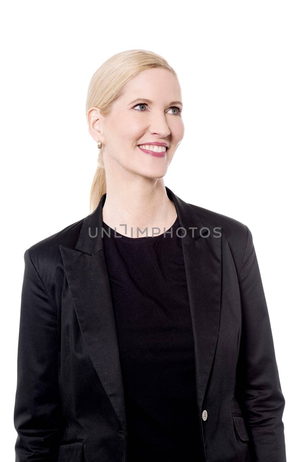 Stylish mid woman looking at copy space