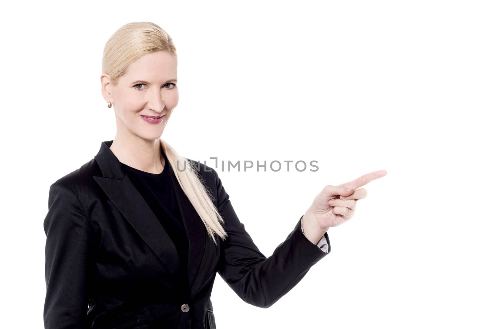 Trendy woman pointing her finger at something