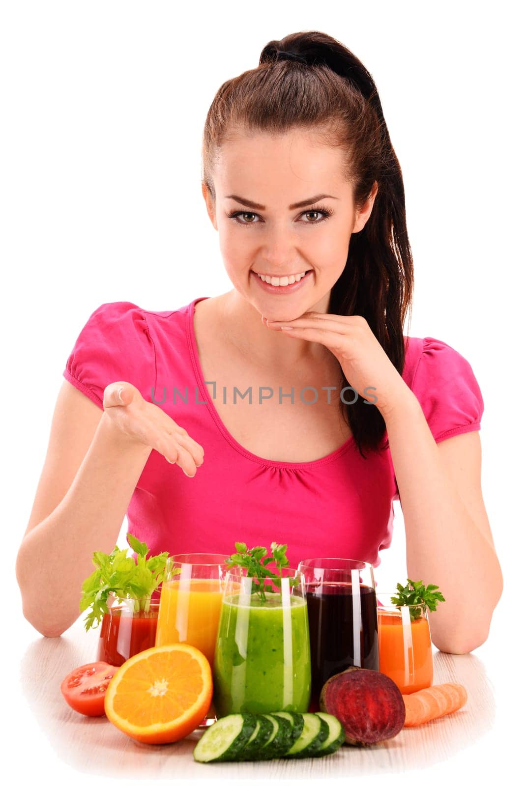 Young woman with variety of vegetable and fruit juices. Detox diet.