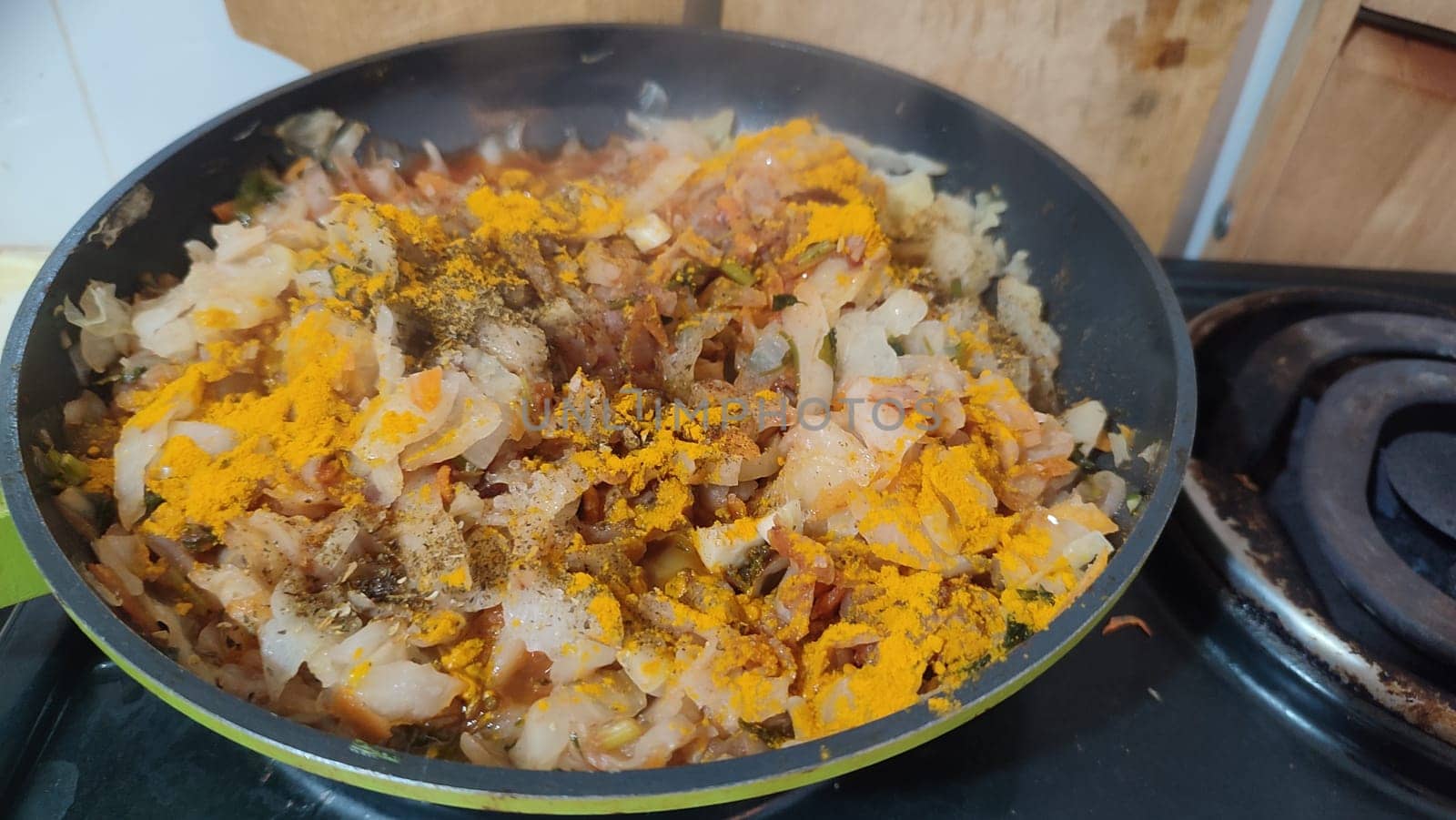 meat vegetables stewed onion frying pan food home cooking stove cooking recipe dish dinner lunch delicious, horizontal format photo. High quality photo