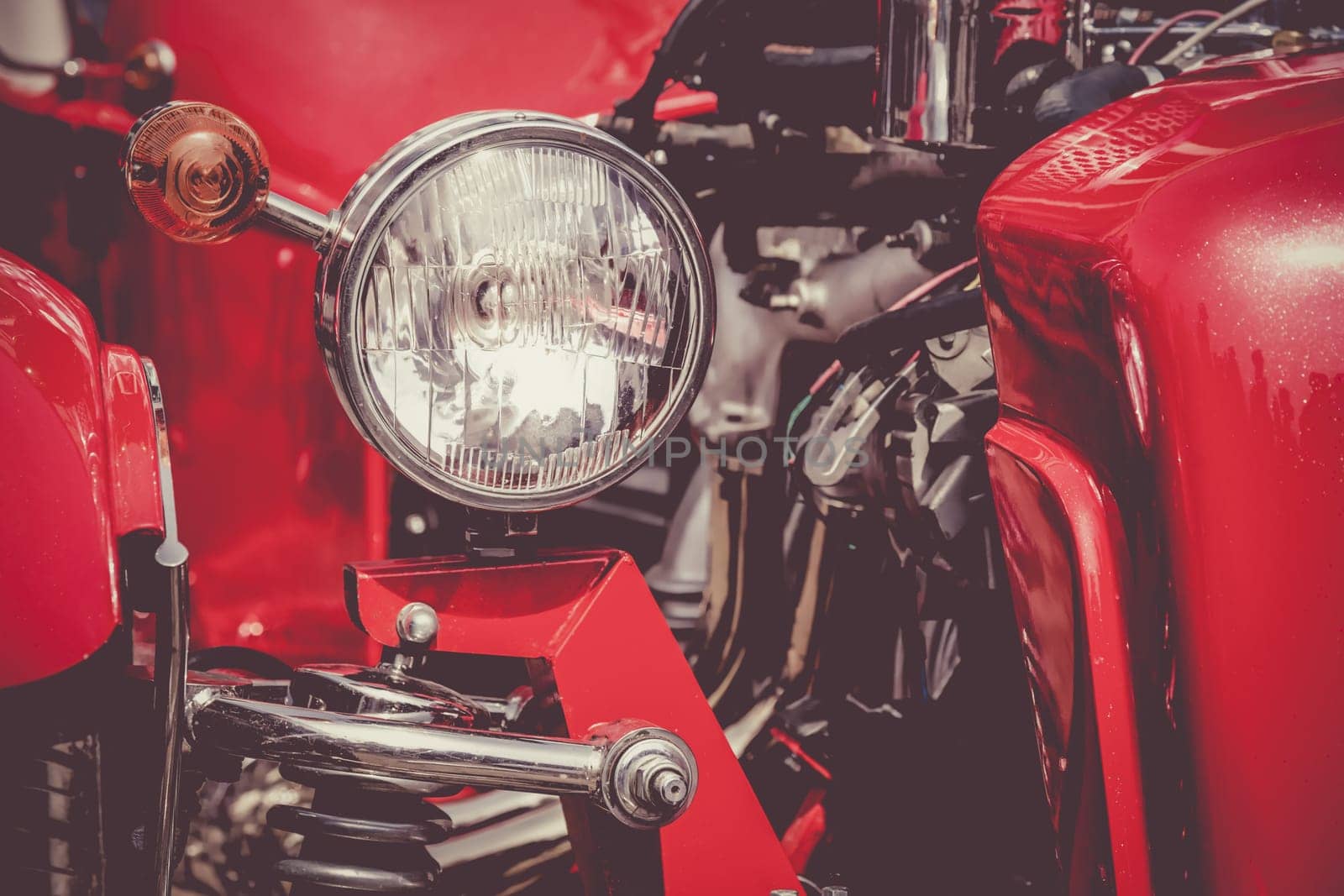 Old retro or vintage car or automobile front side with front light or headlight. Processed by vintage or retro effect filter