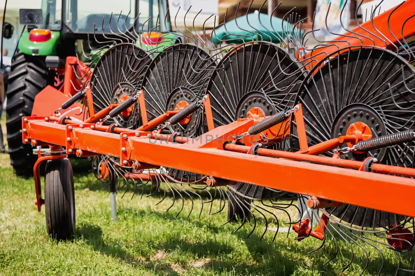 Hay rake farm machinery equipment in agricultural or farmland industry