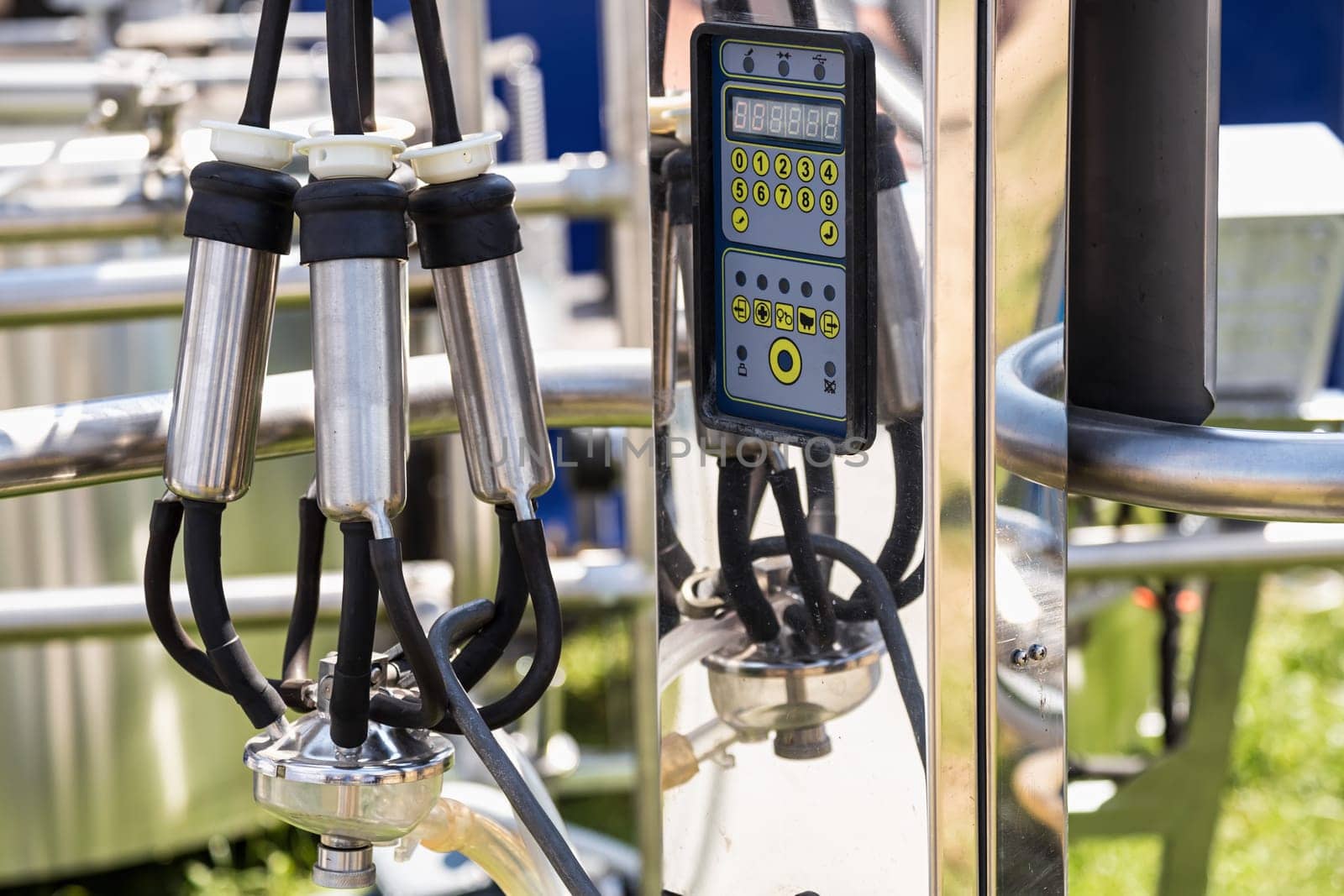 Automated mechanized milking equipment closeup for farmland industry