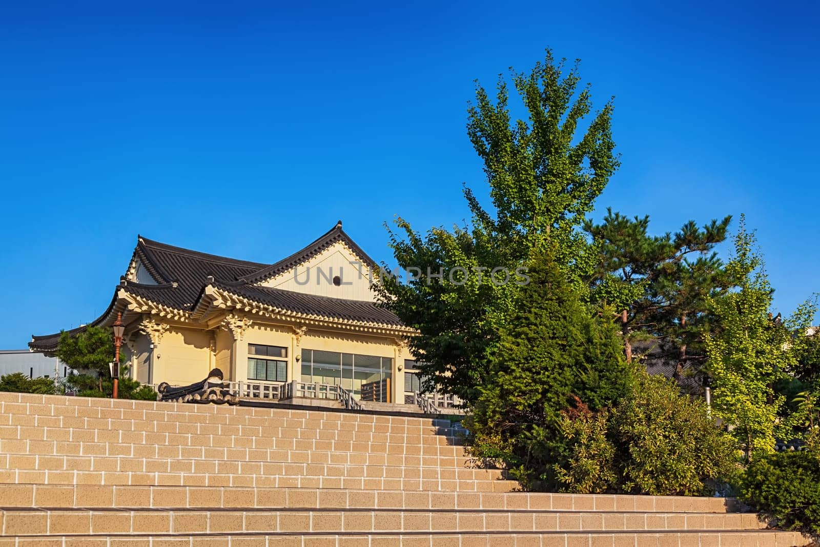 Traditional korean architecture old yellow building or temple with stairs in South Korea city