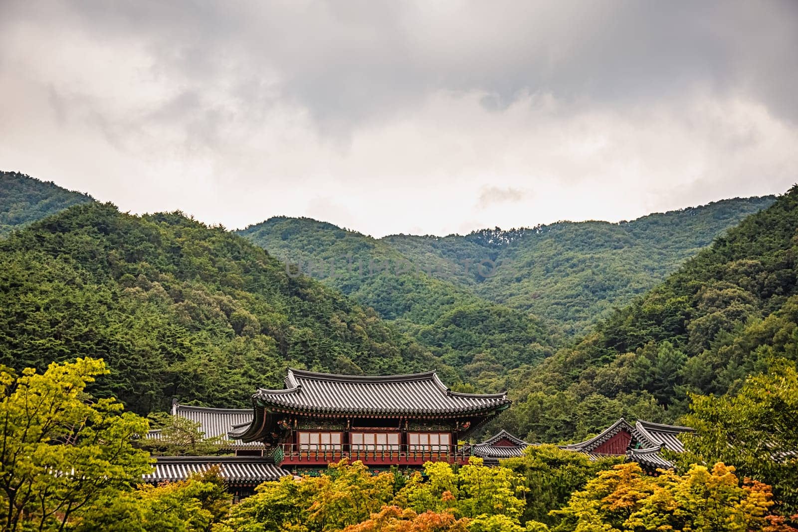 Traditional asian buddhist monks temple in mountains in South Korea at autumn
