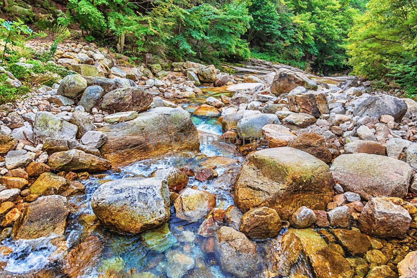 River with rocks and stones in mountain forest in South Korea