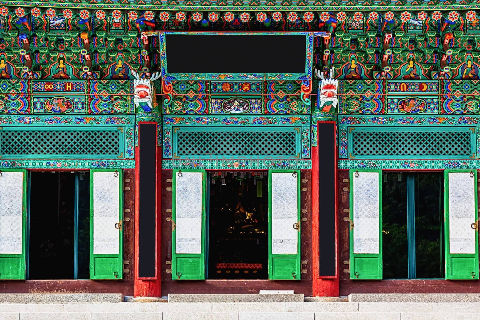 Entrance to buddhist monks temple with traditional decorative patterns in South Korea