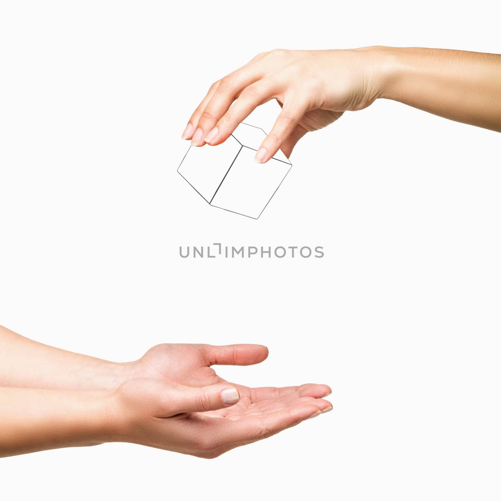 Hand holding and dropping white cube to other hand on white background