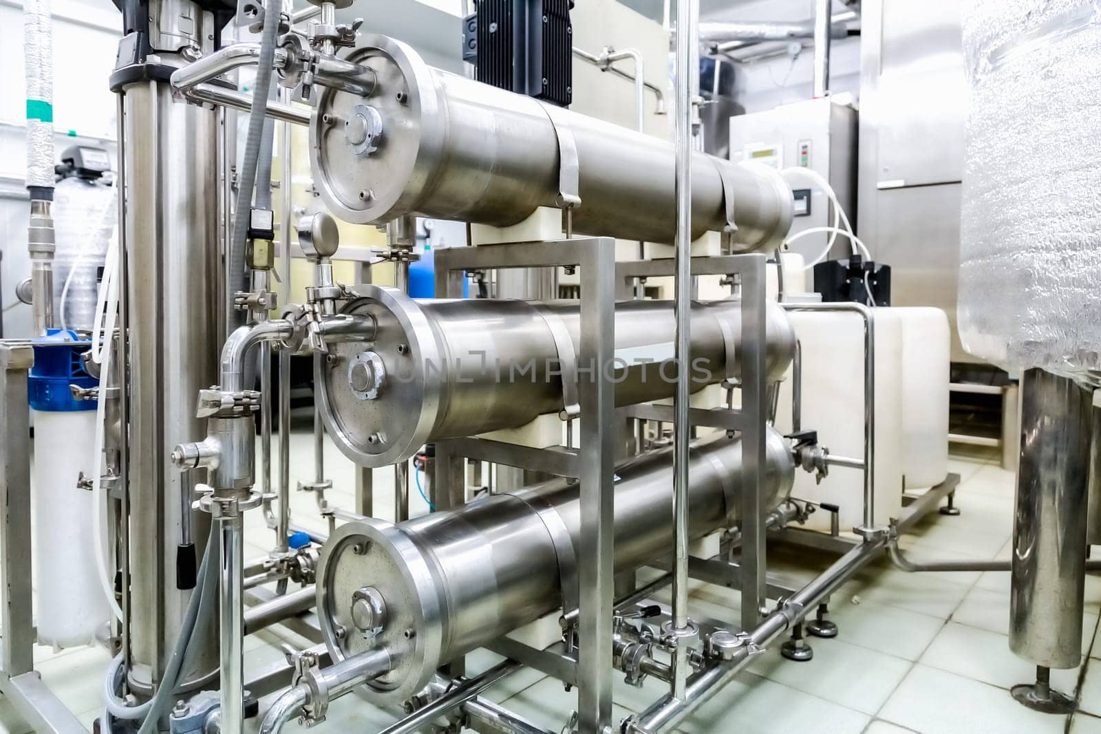 Pipes in conditioning or destilation room on pharmaceutical industry or chemical plant