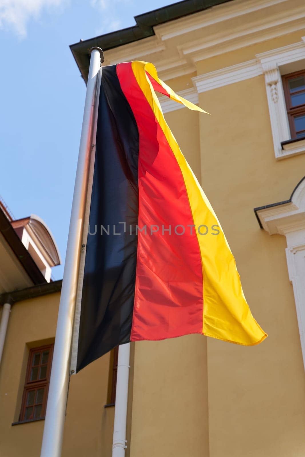 Flag of the Federal Republic of Germany in front of a ministry in Magdeburg
