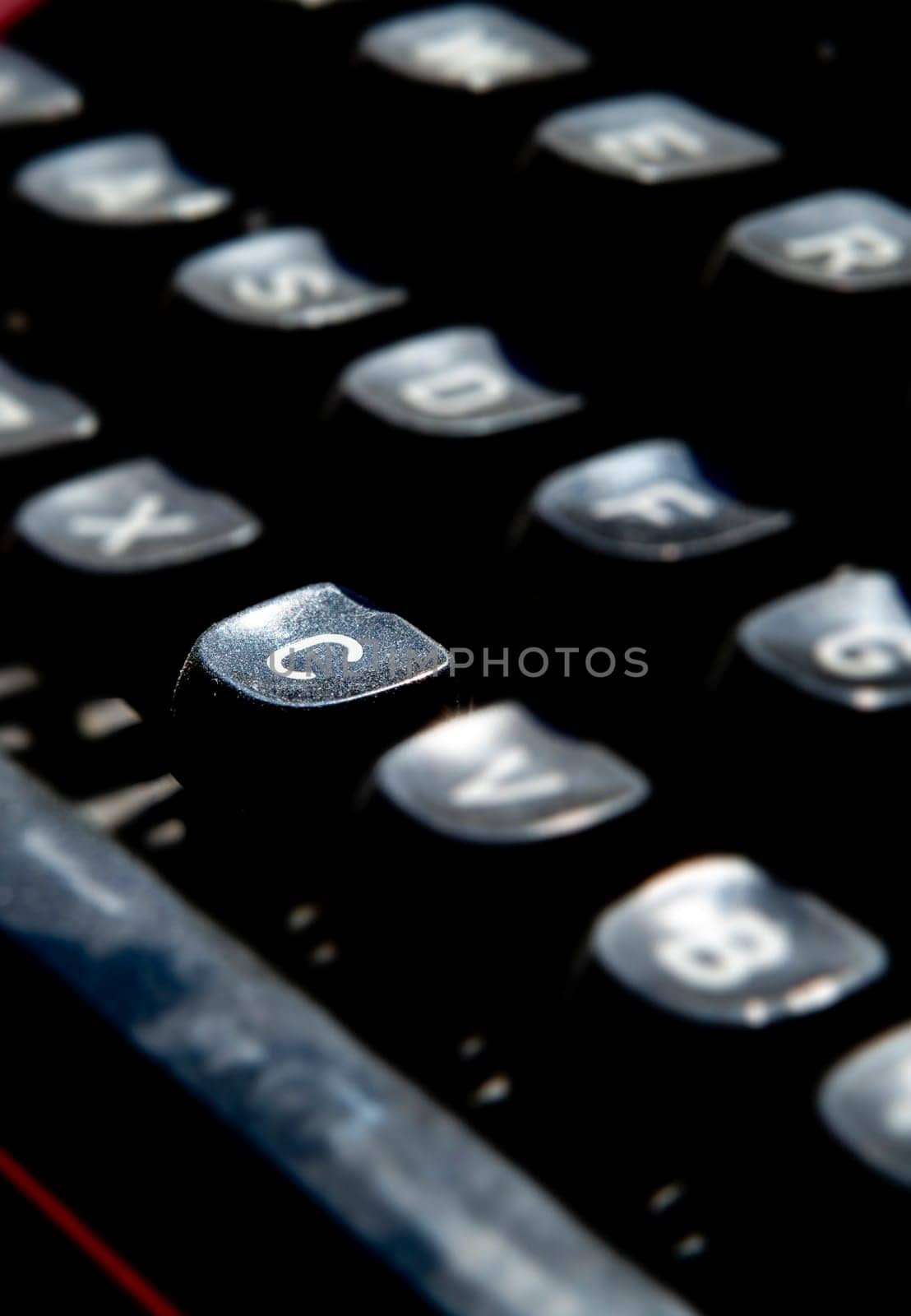 1970s dusty typewriter. Selective focus on key C