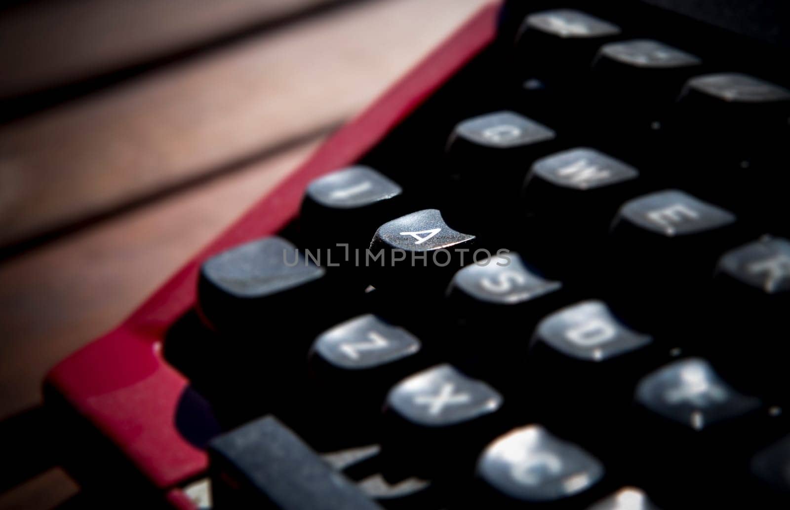 1970s dusty typewriter. Selective focus on key A
