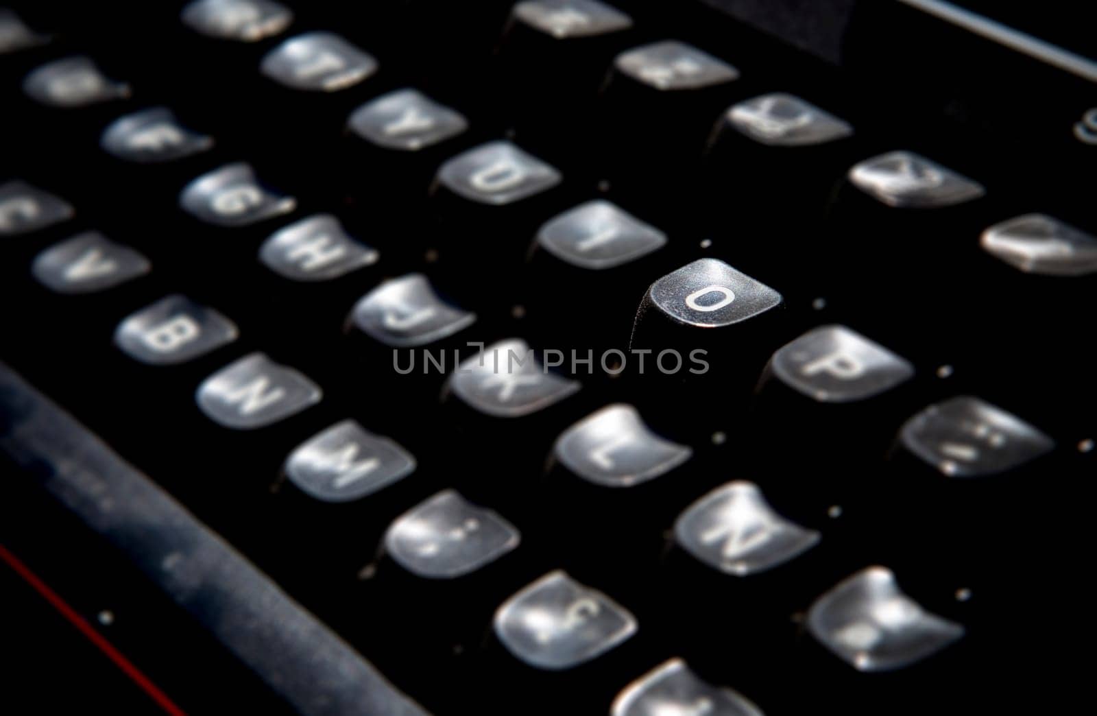 1970s dusty typewriter. Selective focus on key O