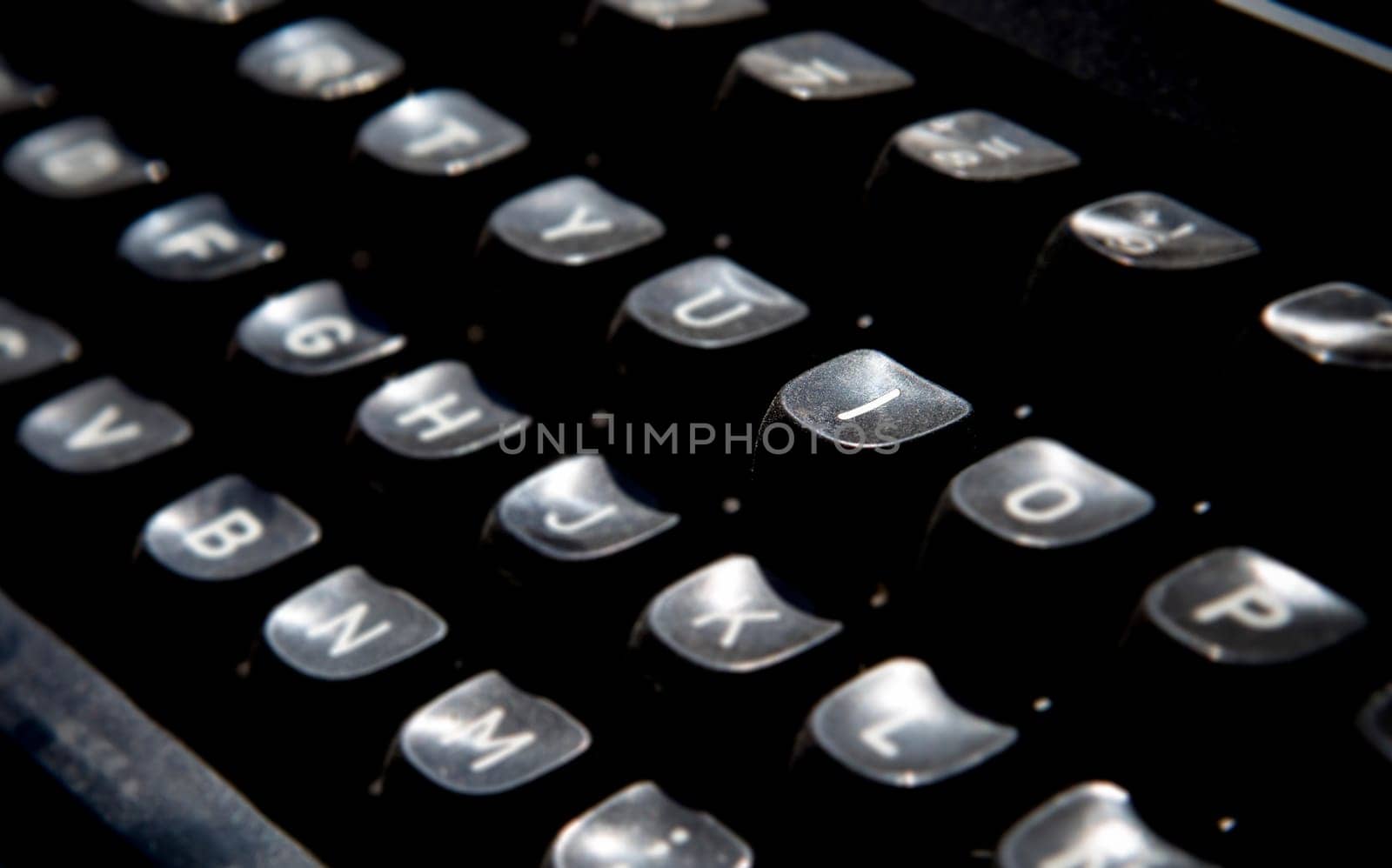 1970s dusty typewriter. Selective focus on key I