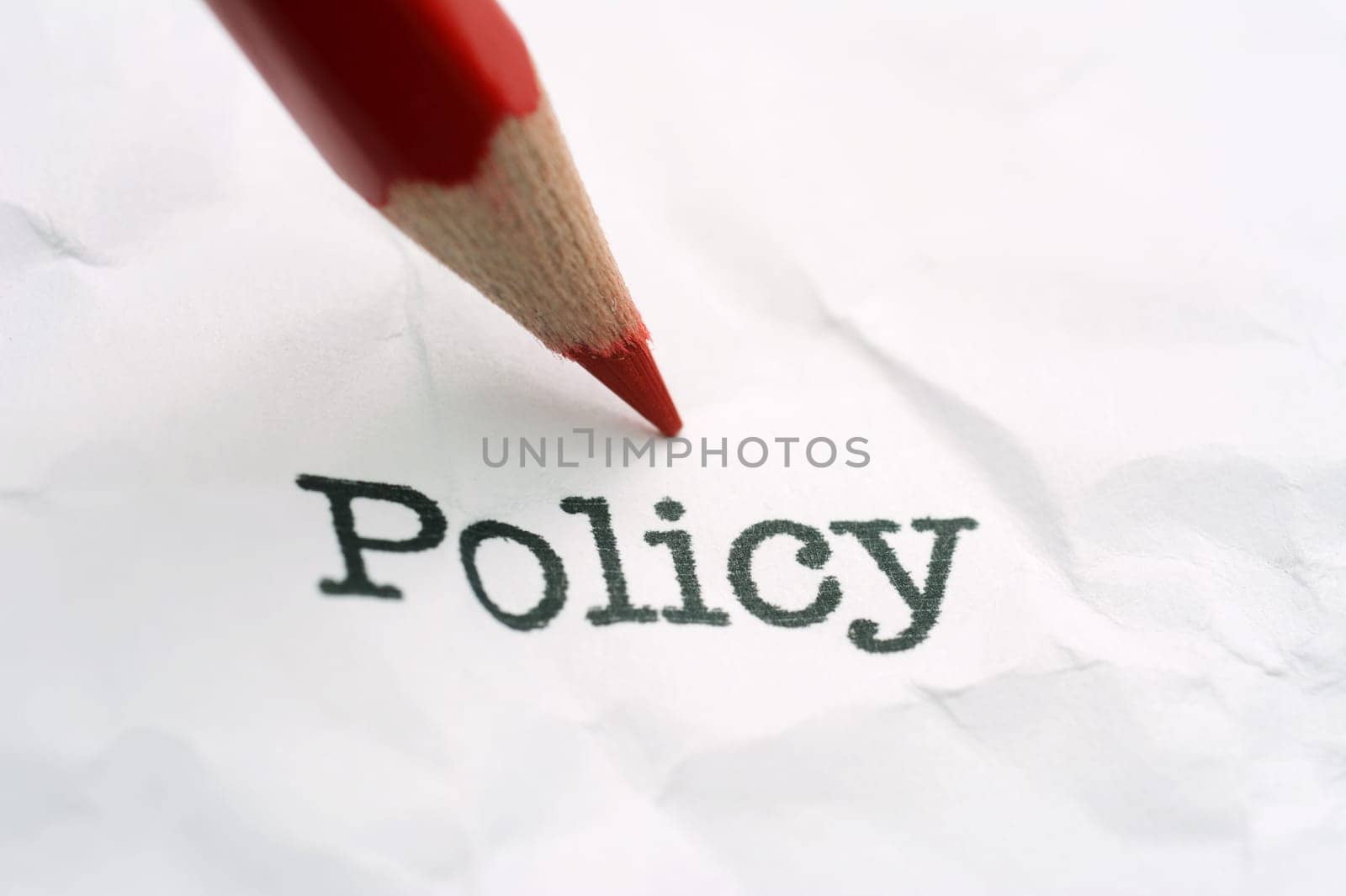 Pencil on policy text