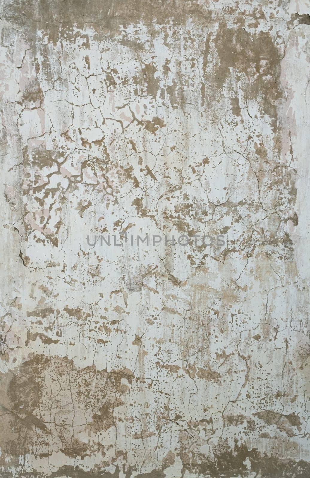 An old peeling whitewash wall background aged