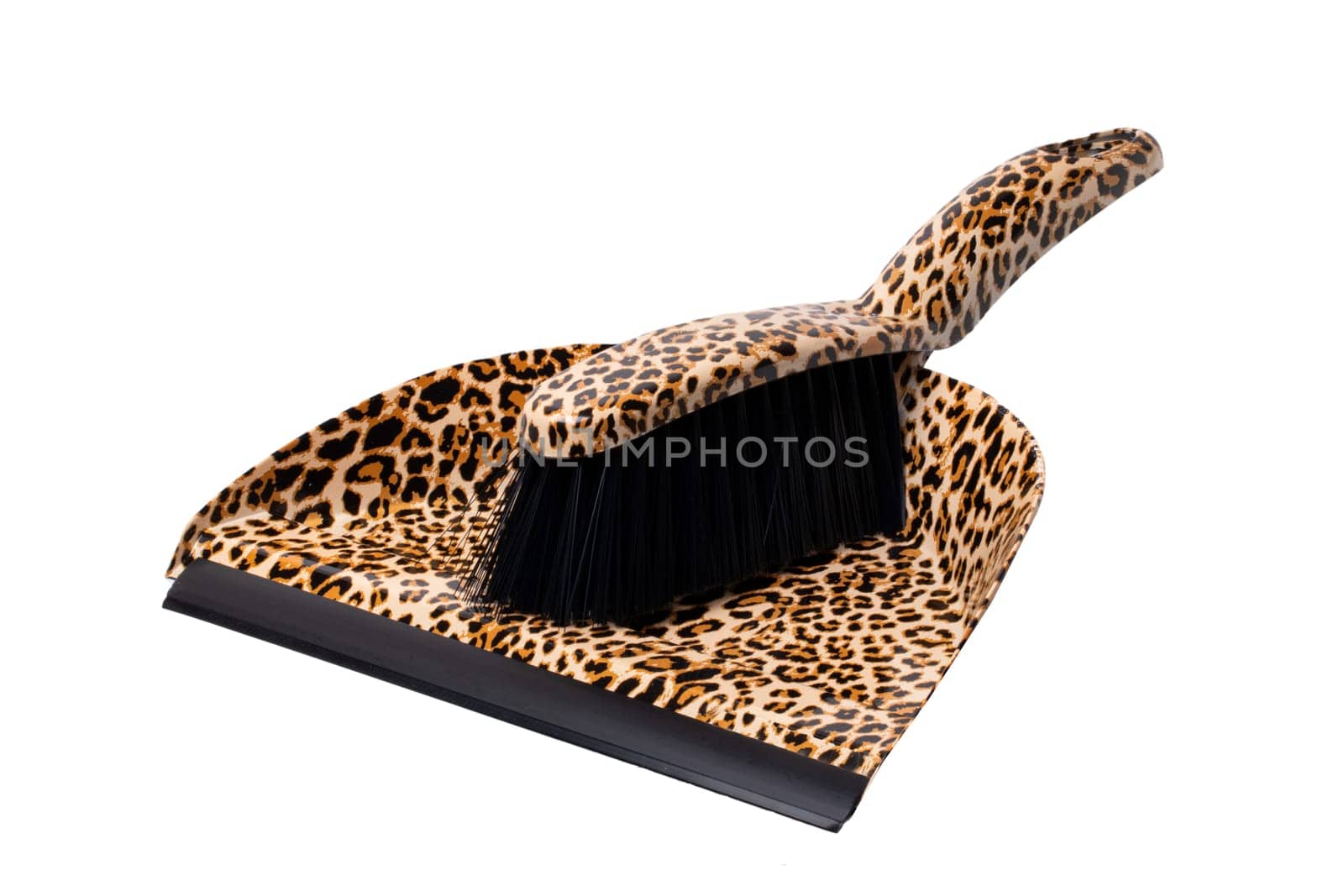 Household cleanliness and hygiene. Closeup of a Dustpan and hand brush isolated on white background. Macro. Household chore concept.