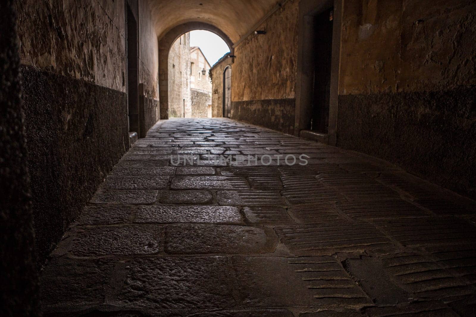 Marquis of Mirabel Palace passage of Plasencia. Medieval street at Old town, Caceres, Extremadura, Spain