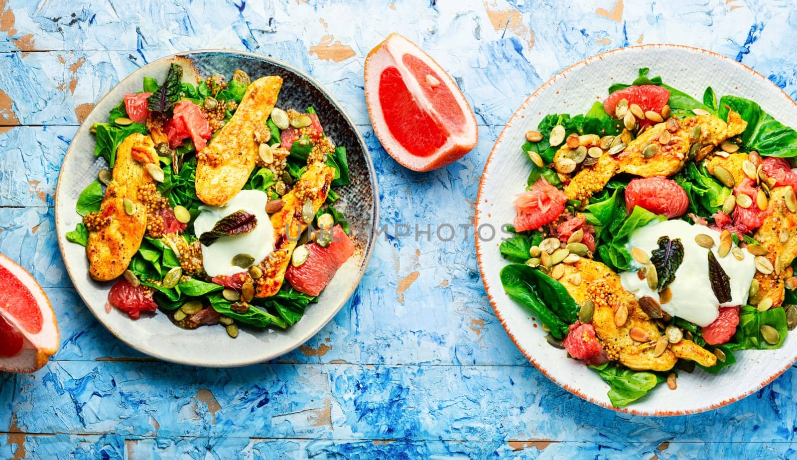 Appetizing salad of chicken breast, grapefruit, herbs and yogurt.