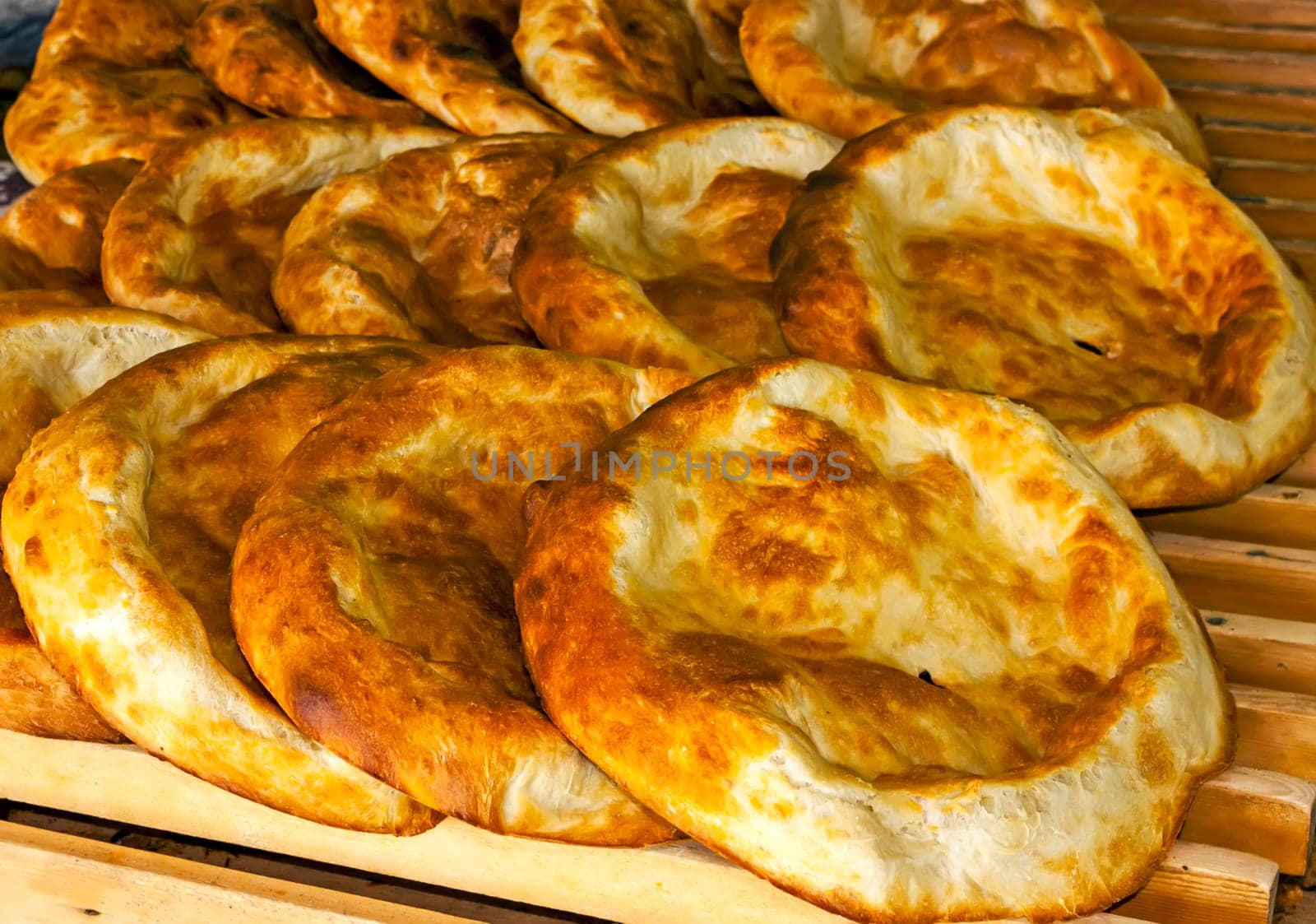 Freshly baked lavash bread on pallet,Armenia.
