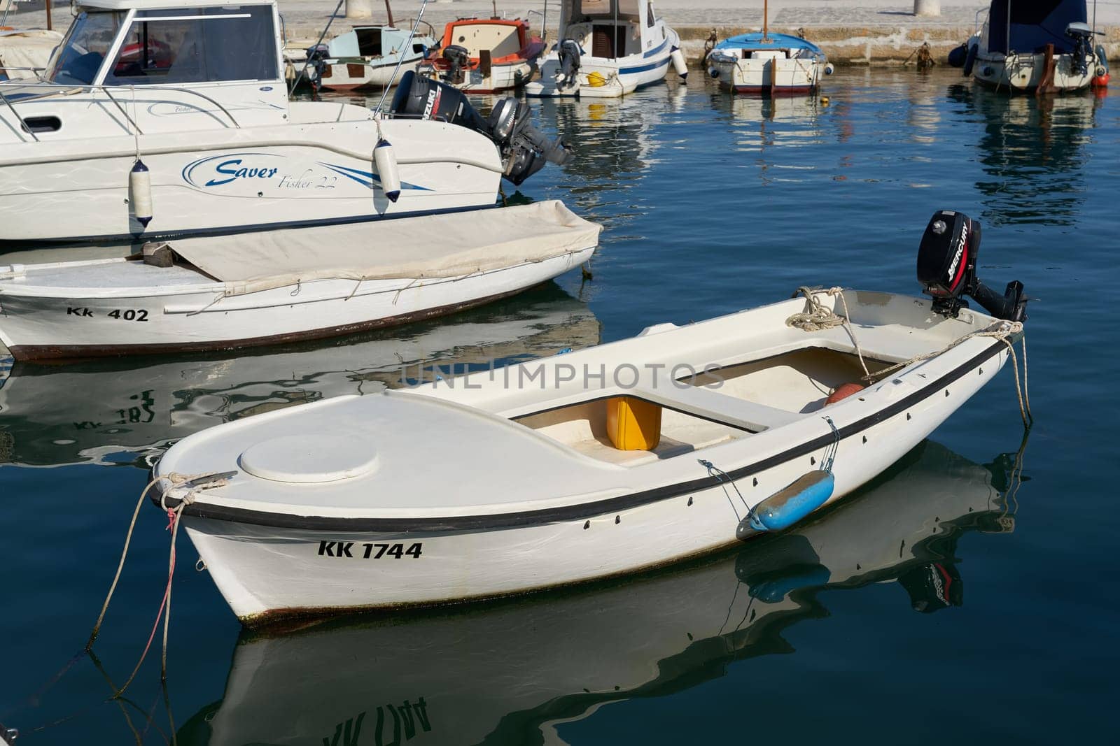 Fishing boats in the harbor of the town of Krk on the Adriatic Sea in Croatia