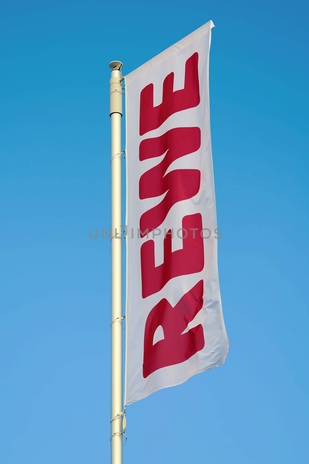 Flag in front of the new central warehouse of the German food retailer Rewe in Magdeburg
