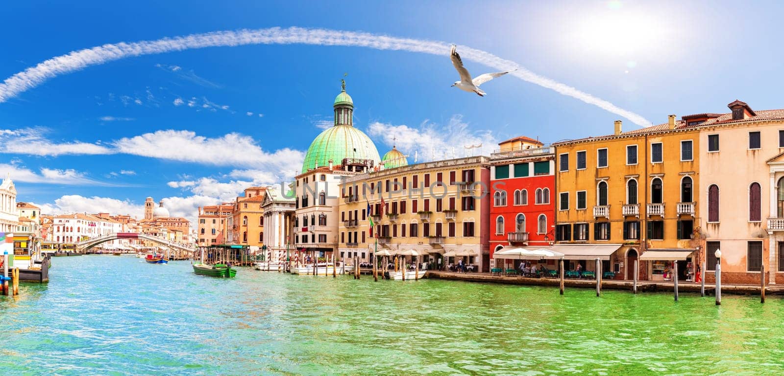 Grand Canal panorama near the Scalzi Bridge and San Simeone Piccolo church, Venice, Italy.