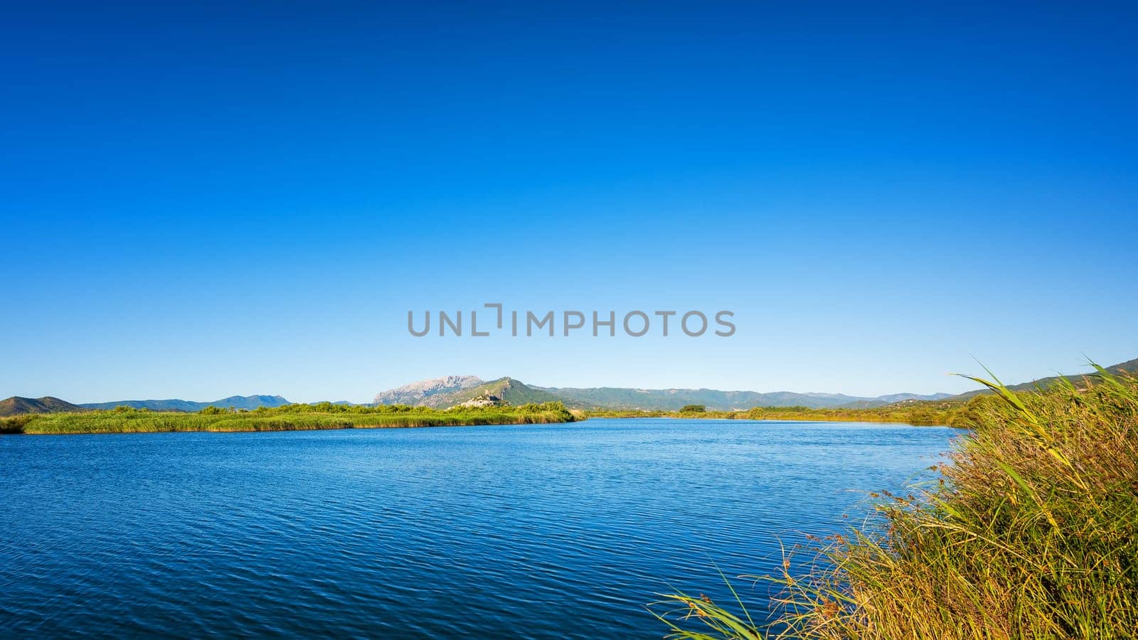 Panoramic view of the Posada pond in the Tepilora regional park. Unspoiled nature.
