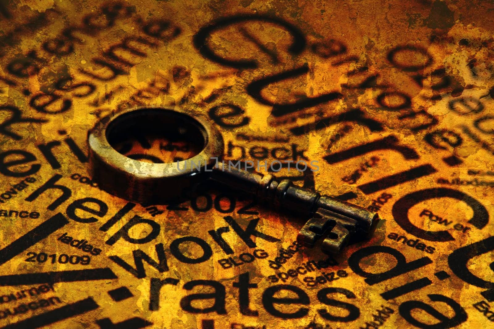Close up of a Curriculum Vitae with old key