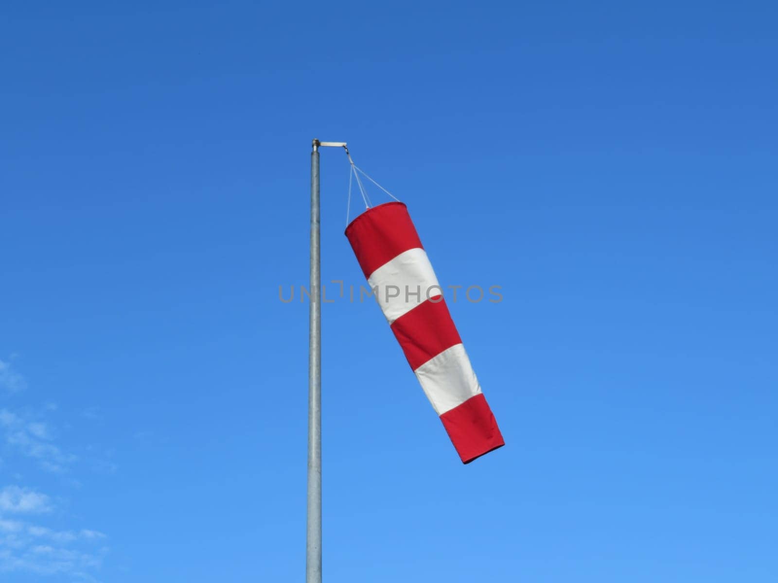 red and white wind indicator safety signal warning