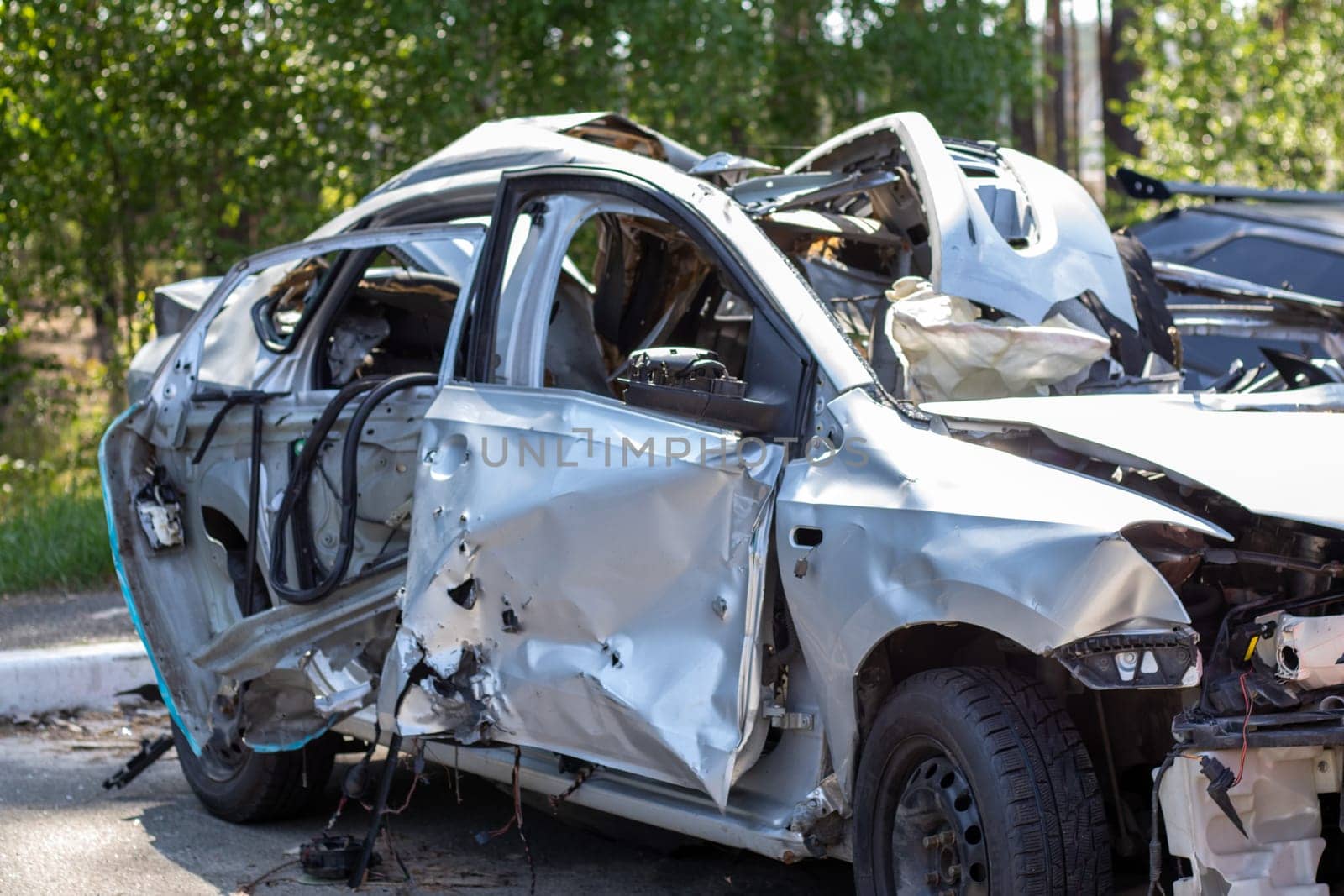 Traffic accident on the street, damaged car after a collision in the city. Accident due to speeding and alcohol intoxication. Transport background. The concept of road safety and insurance