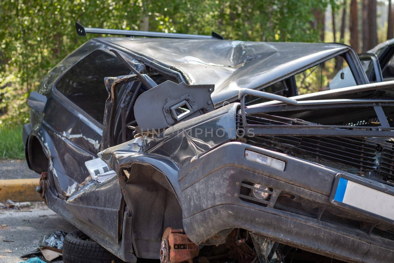 Traffic accident on the street, damaged car after a collision in the city. Accident due to speeding and alcohol intoxication. Transport background. The concept of road safety and insurance
