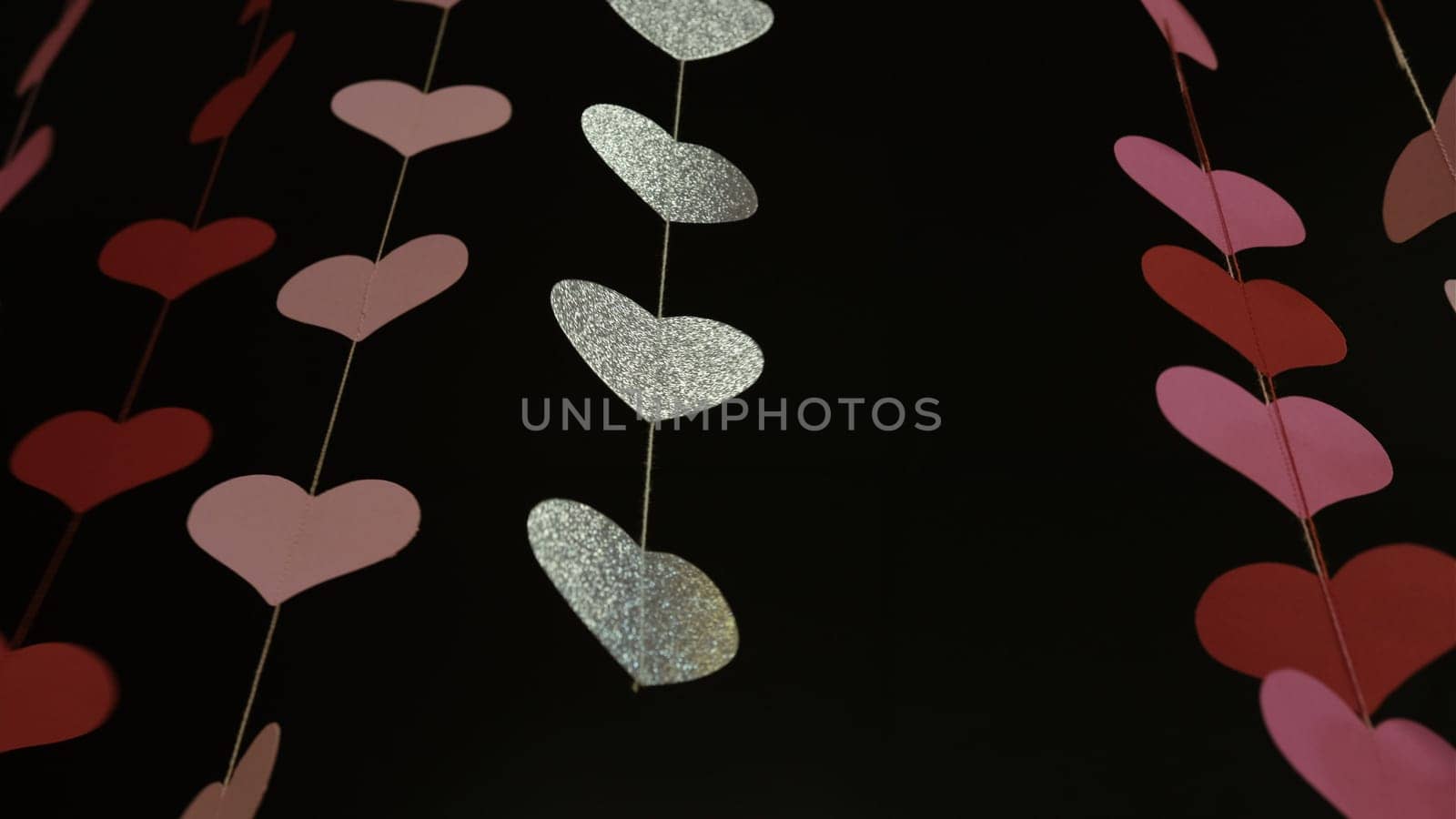 Flying red paper hearts on red dark background. Valentines Day. Symbol of love. beautiful flying pink hearts. Happy Valentines Day. Full of Love. 4k 400mb s. Love day.