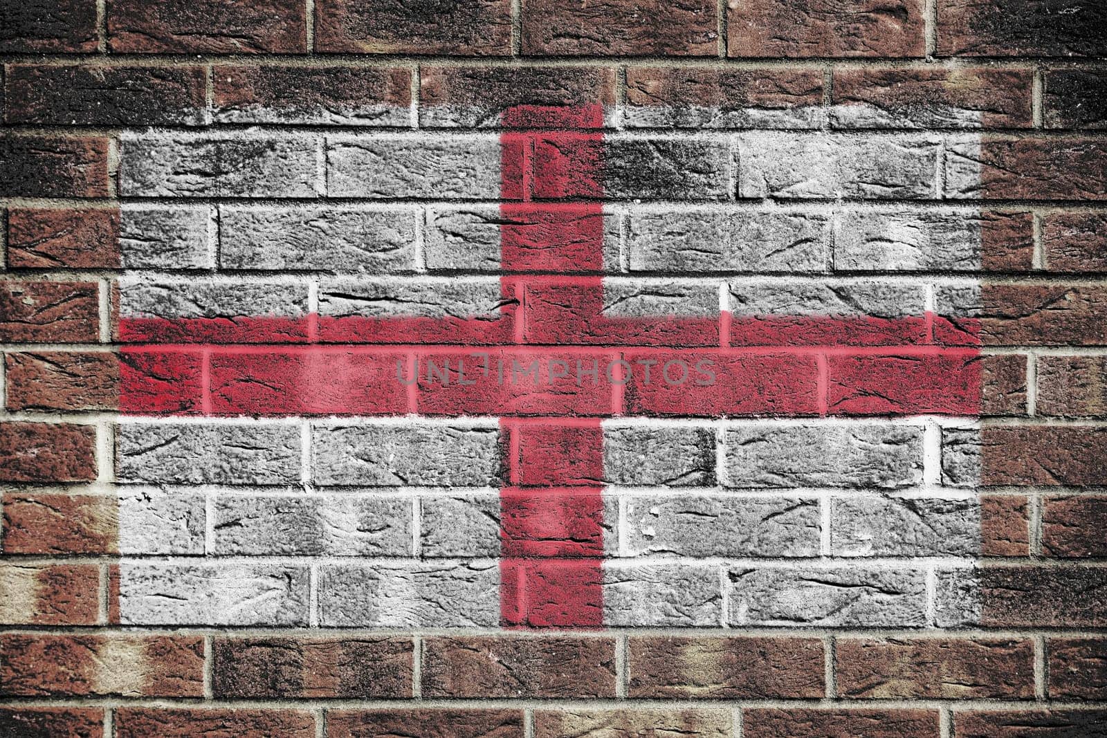 An England flag on a brick wall background