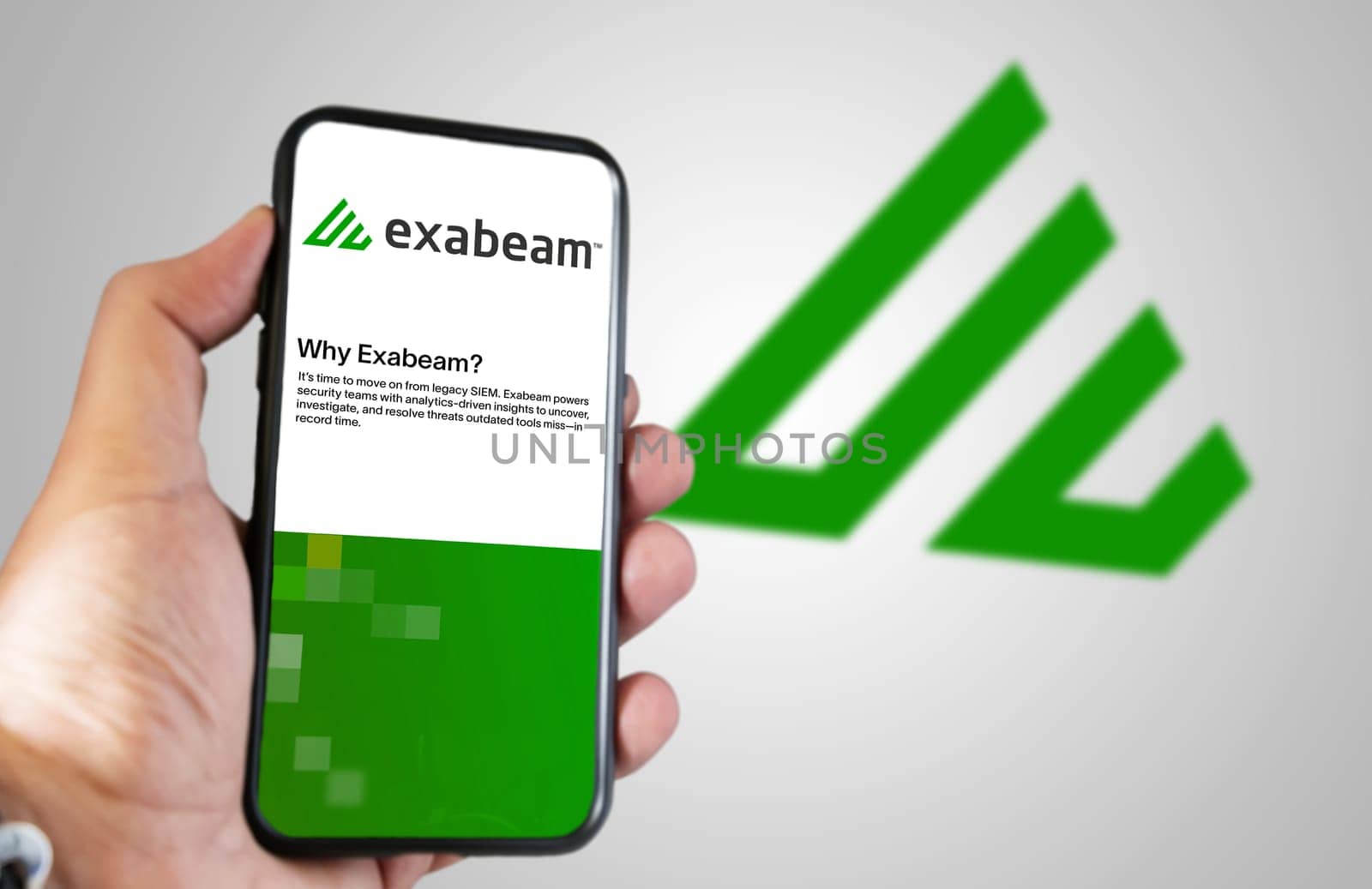 San Francisco, USA, June 2022: hand holding a phone with Exabeam mobile application on screen. Exabeam is a leading provider of the software for analyzing user and company behavior