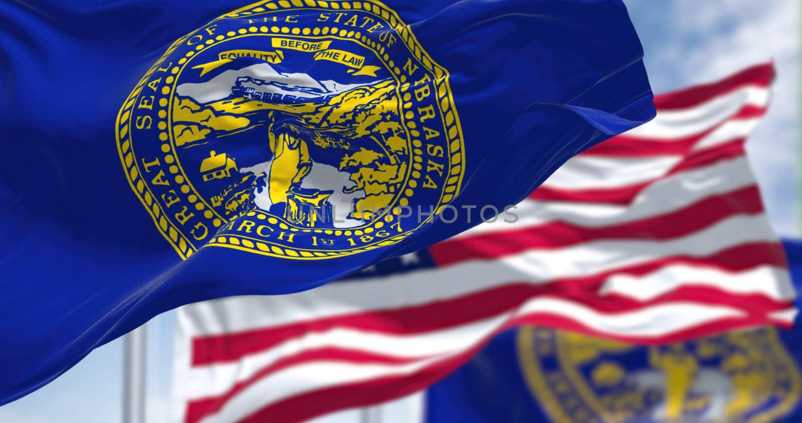 The flags of the Arkansas state and United States waving in the wind. Democracy and independence. American state. Seamless 3D animation