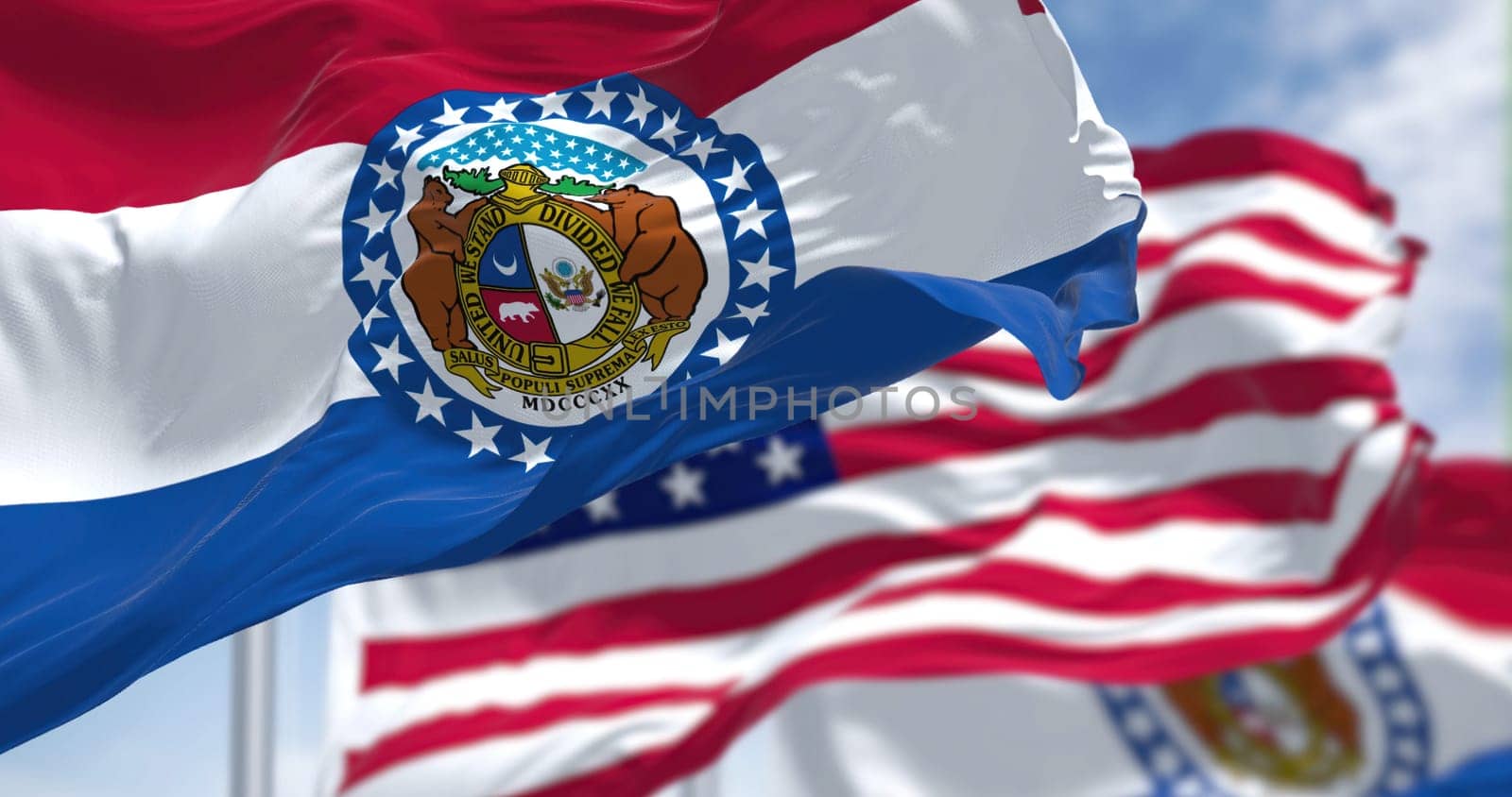 The flags of the Arkansas state and United States waving in the wind. Democracy and independence. American state. Seamless 3D animation