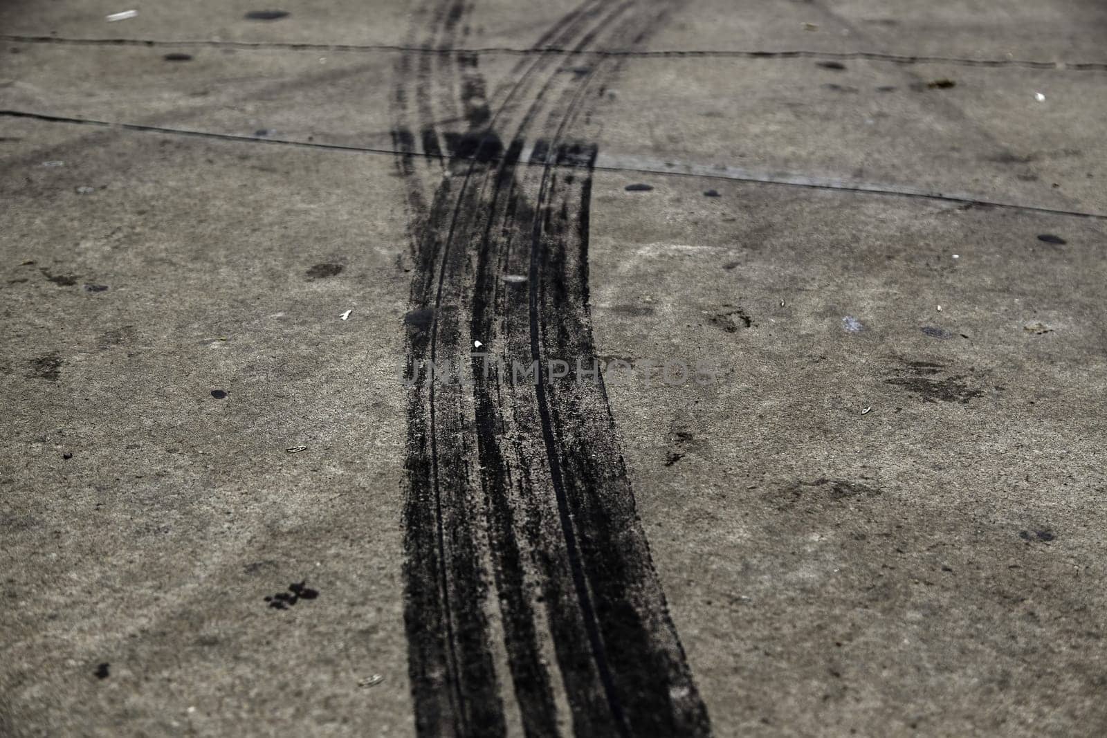 Detail of tire rubber marks, speed