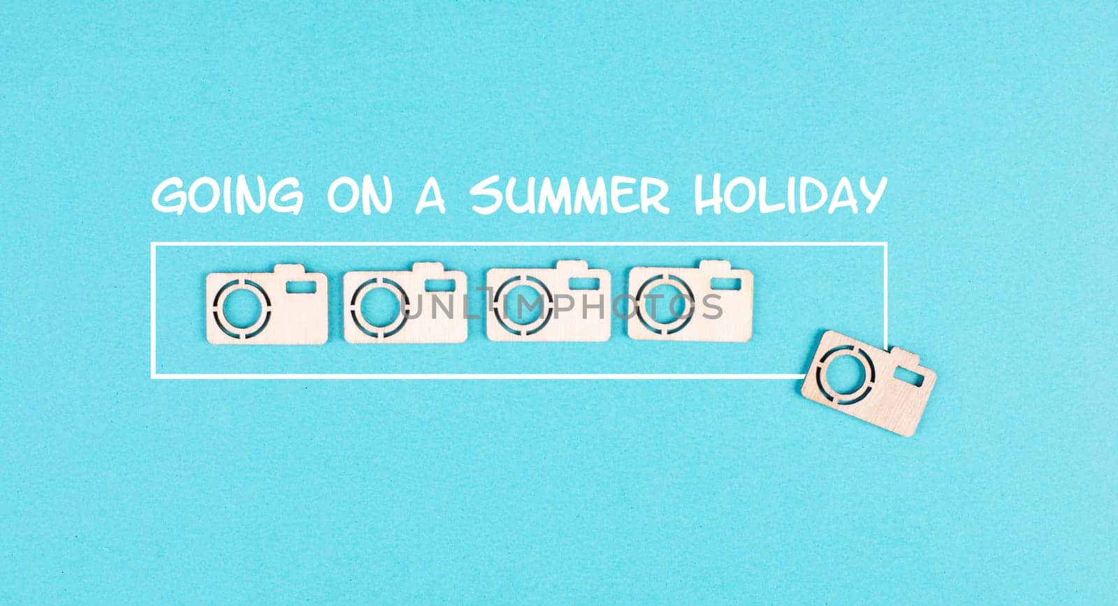Progress bar with cameras on a blue paper, planning a trip for the weekend, vacation and travel concept, photographer