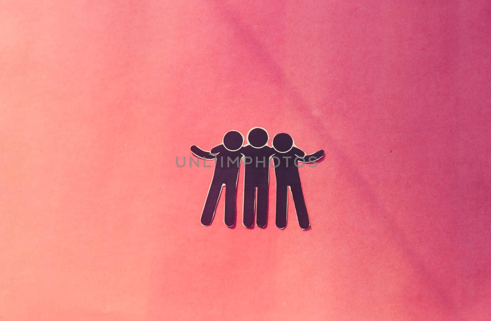 Paper cut happy friends with hand on shoulder in color background. Concept of friendship, help, support, love and togetherness.
