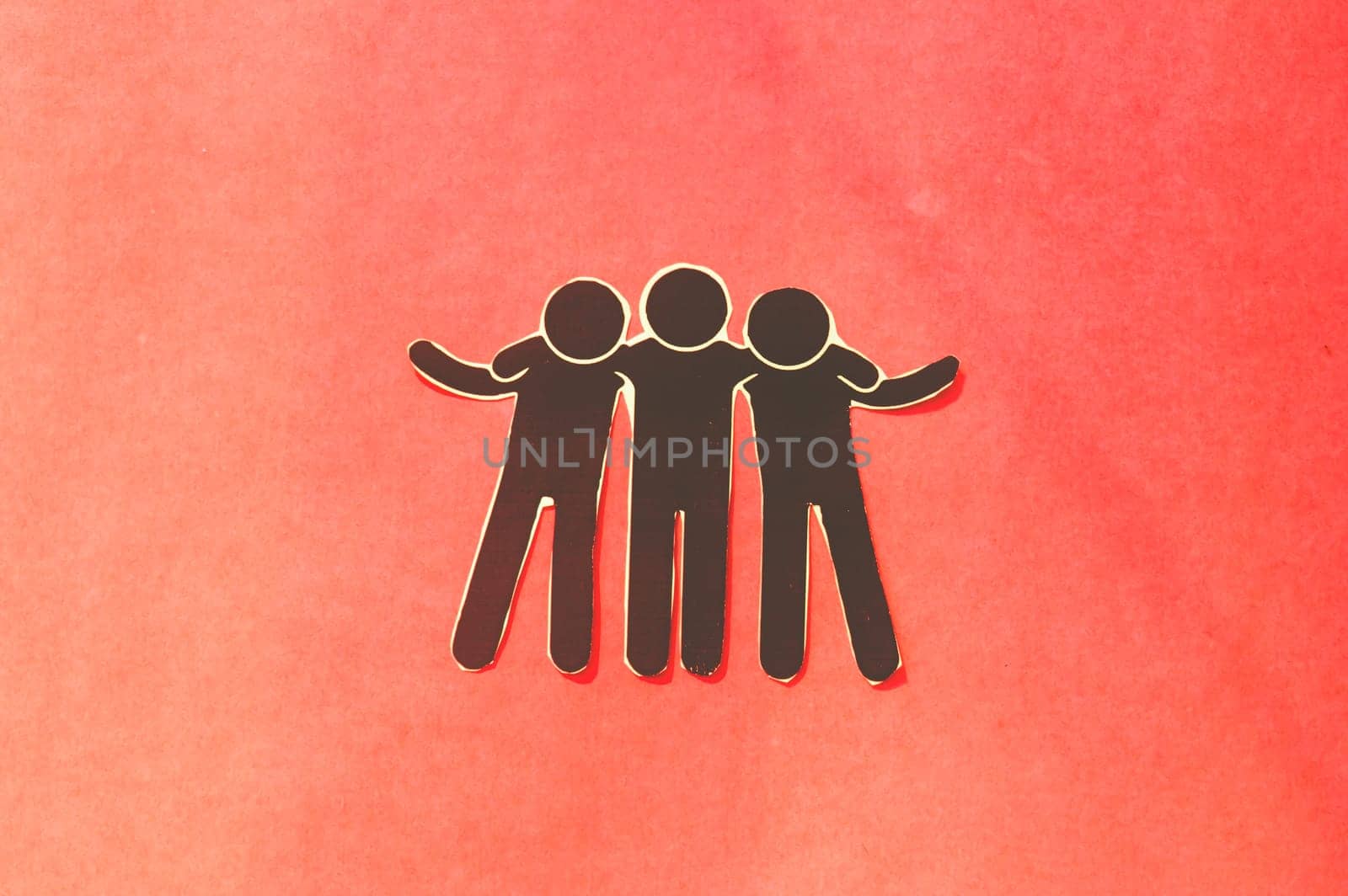 Paper cut happy friends with hand on shoulder in color background. Concept of friendship, help, support, love and togetherness.