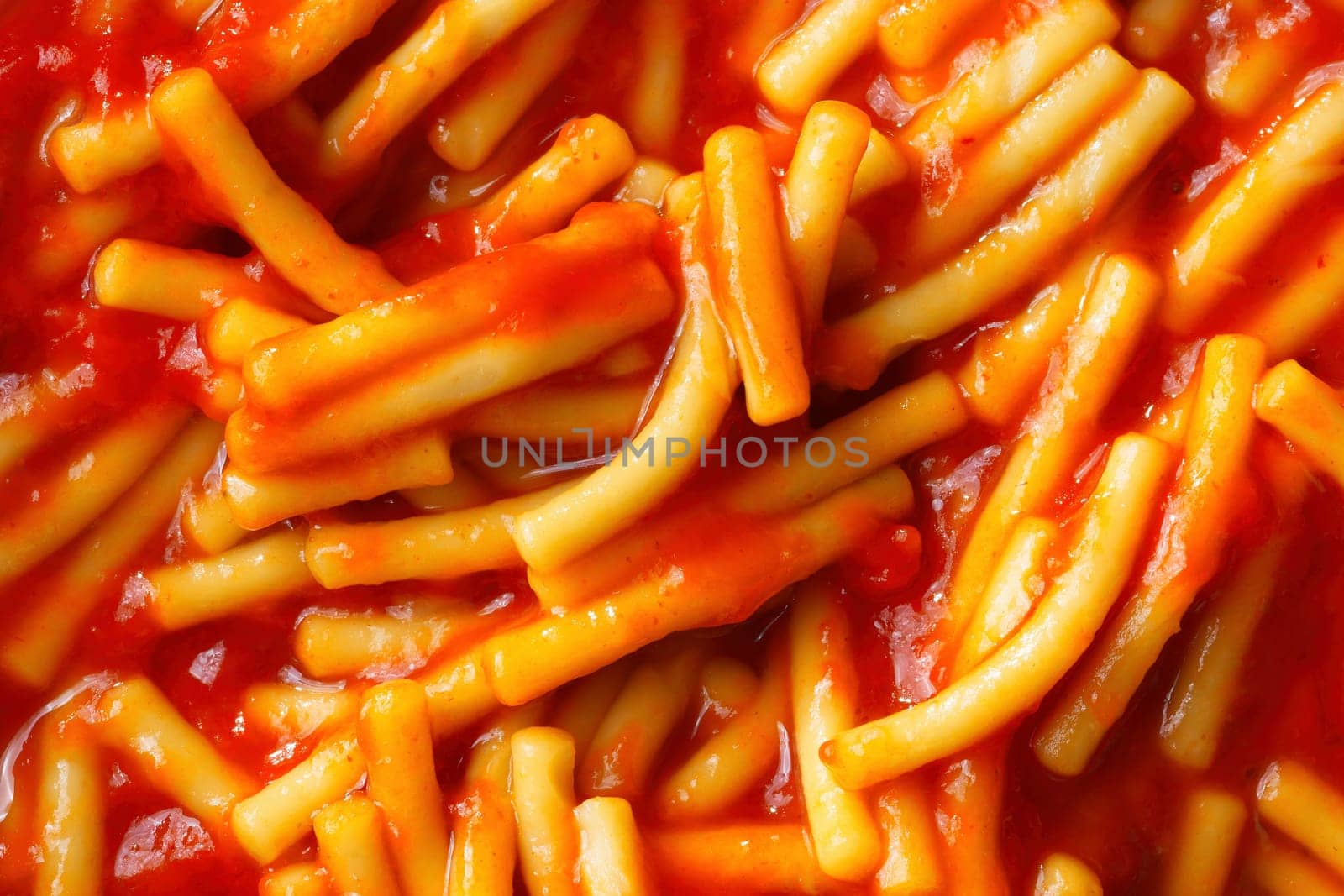 close up of spaghetti noodle in tomato sauce food background