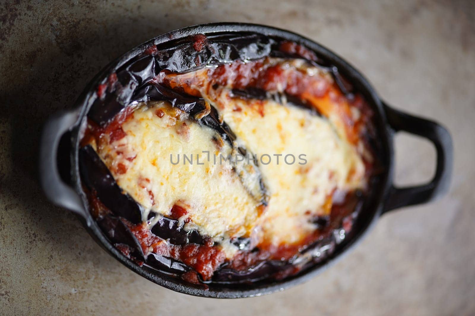 close up of rustic italian comfort food eggplant parmigiana