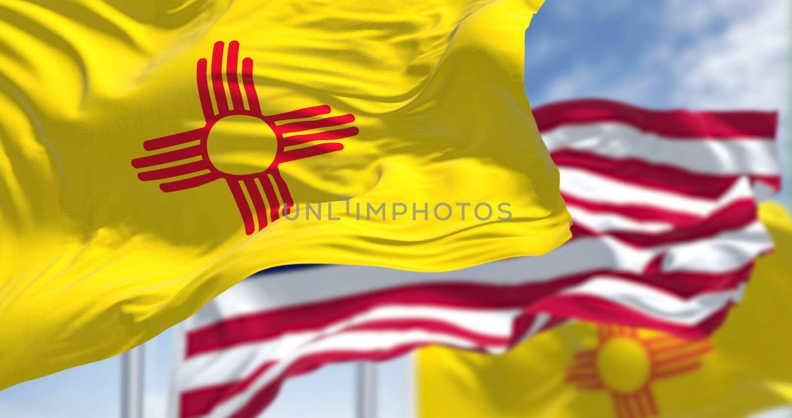 The flags of the Arkansas state and United States waving in the wind. Democracy and independence. American state. Seamless 3D animation